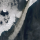 An ash plume measuring 100 km (60 miles) flows from the Kambalny crater, in the upper right hand corner of the photo, towards the south and the southwest of the Kamchatka Peninsula, Russia, March 25. (NASA Earth Observatory/MODIS)